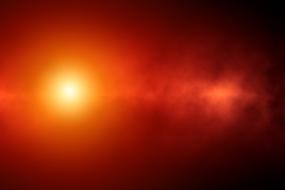 sun clouds fog red