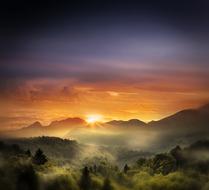 photo of dawn over the mountains on the wallpaper