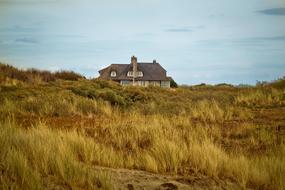 old village house on sand dune