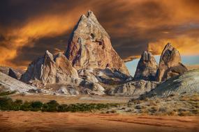 yellow dramatic sky over mountain landscape