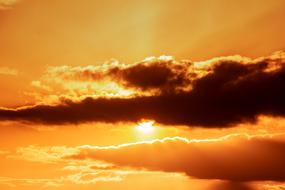 Beautiful and colorful, hidden sunset behind the clouds