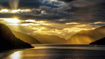Beautiful and colorful dawn over the fjords and water in Norway