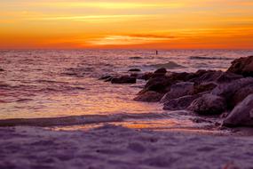 orange Sunset sky above purple Ocean, usa, Florida