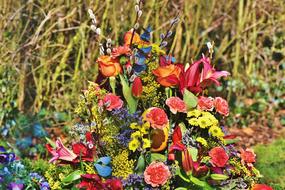 many coloring flowers on the grave