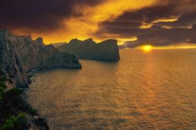 panoramic view of the rocky coastline in the evening storm