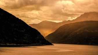 scenic calm Fjord at cloudy Sunrise, Norway