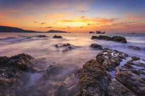 sea sunset over the stone coast