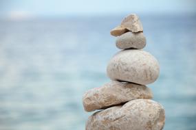 stacked pebbles at Sea, cairn