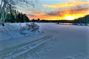 evening photo of frozen lake in Quebec, Canada