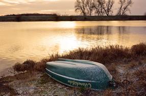 Boat Rowing on bank at Winter