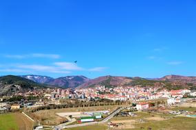 City Buildings and Mountains