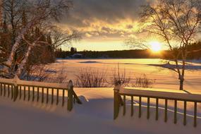 scenic Sunset in countryside at snowy winter, Landscape