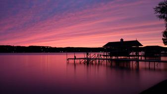 Beautiful landscape with the boat dock, at colorful, gradient sunset