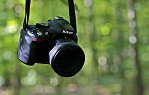 Nikon camera in a forest