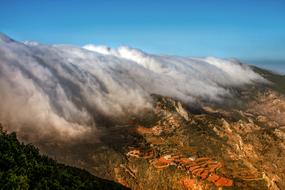 Beautiful and colorful landscape of the beautiful mountains in Tenerife, at blue sky on background