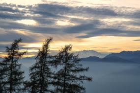 Evening Sky over foggy mountain landscape