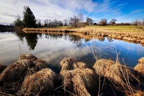 cirrus clouds mirroring on Lake at fall