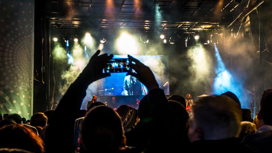 concert crowd in the dark
