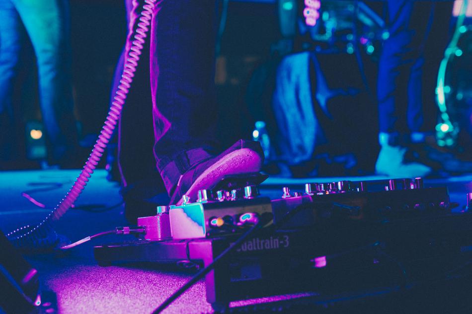 DJ's foot on the amp pedal
