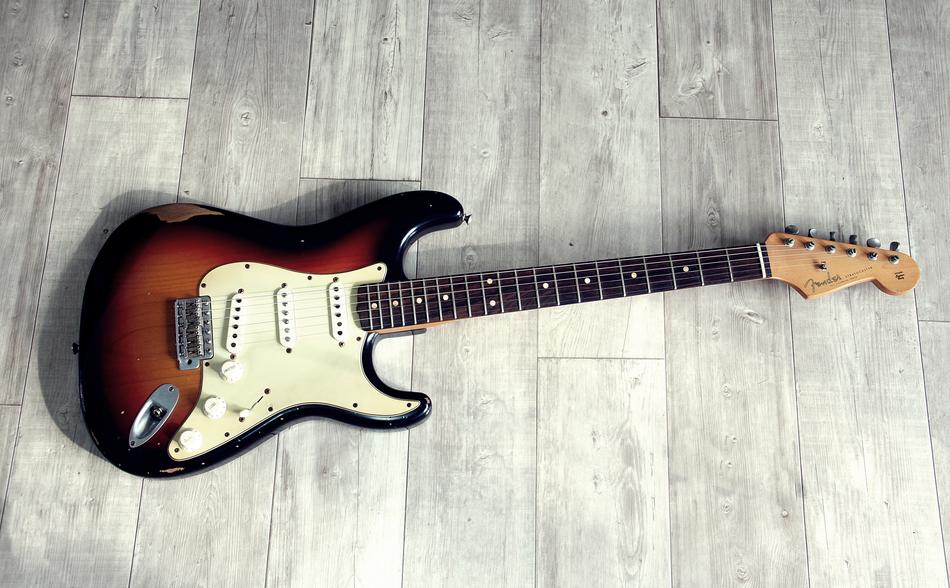 rock guitar lying on the floor