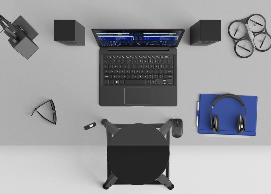 Laptop, headphones, drone and speakers and other gadgets, at the workspace