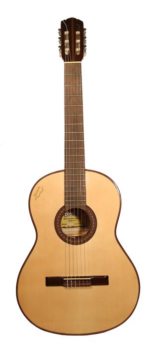 Beautiful, classic, wooden, Spanish guitar at white background
