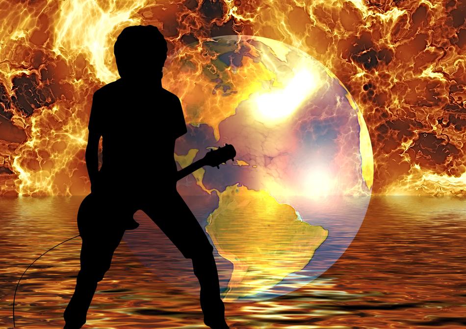 boy guitarist on the Earth background