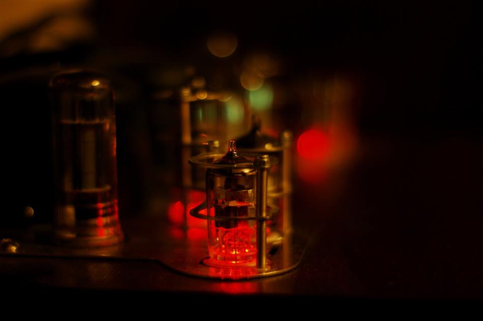 macro photo of vacuum tubes on a bright amplifier