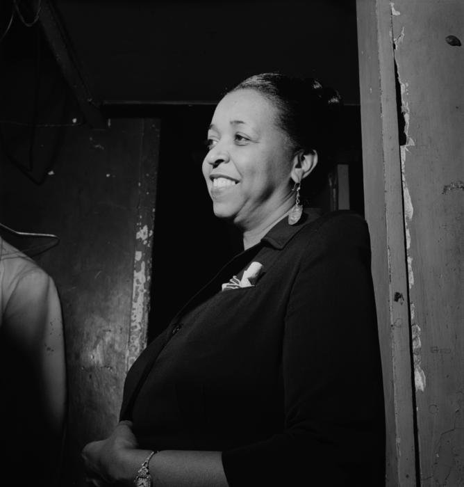 Black and white portrait of the smiling Ethel Waters