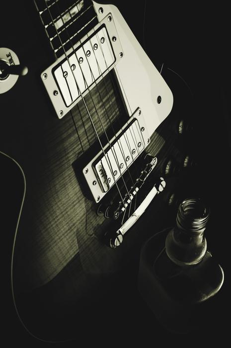 black and white picture of an electric guitar