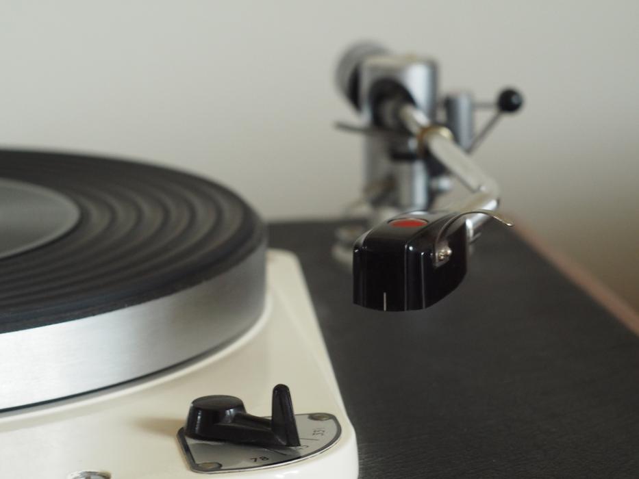 Beautiful, shiny turntable with the vinyl on play