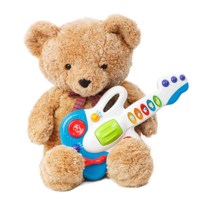 teddy bear with musical toy guitar