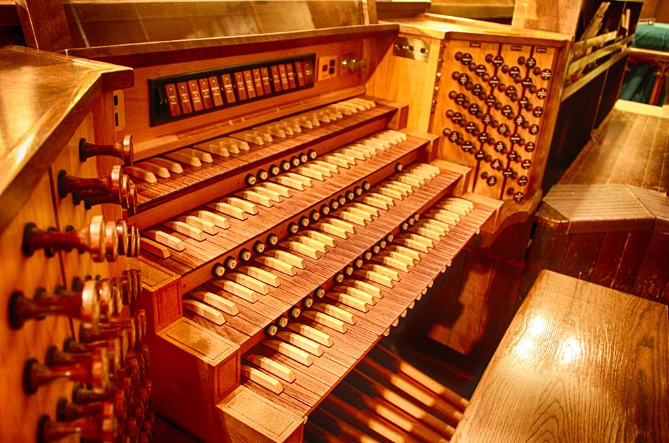 Beautiful, wooden piper organ in light