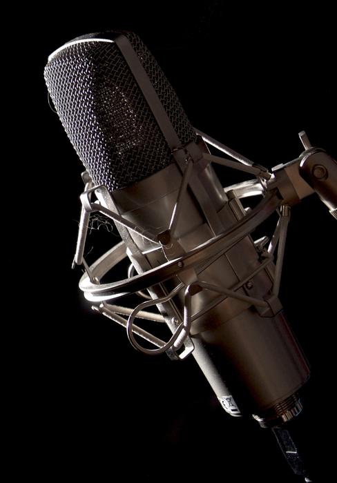 Studio Microphone on the black background