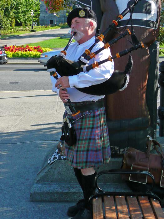 Bagpiper as a street musician in scotland