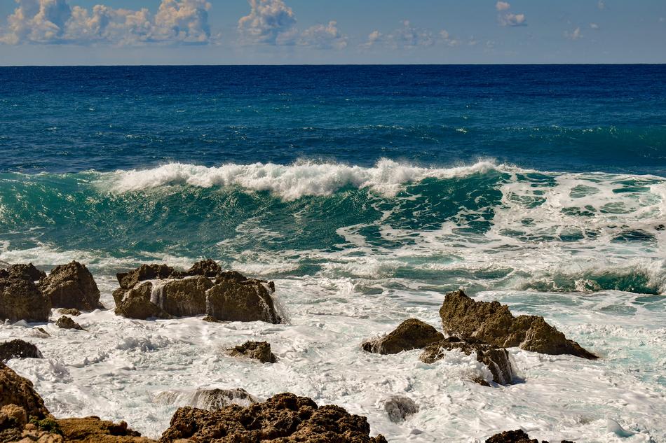 splashing waves in Cyprus on a sunny day