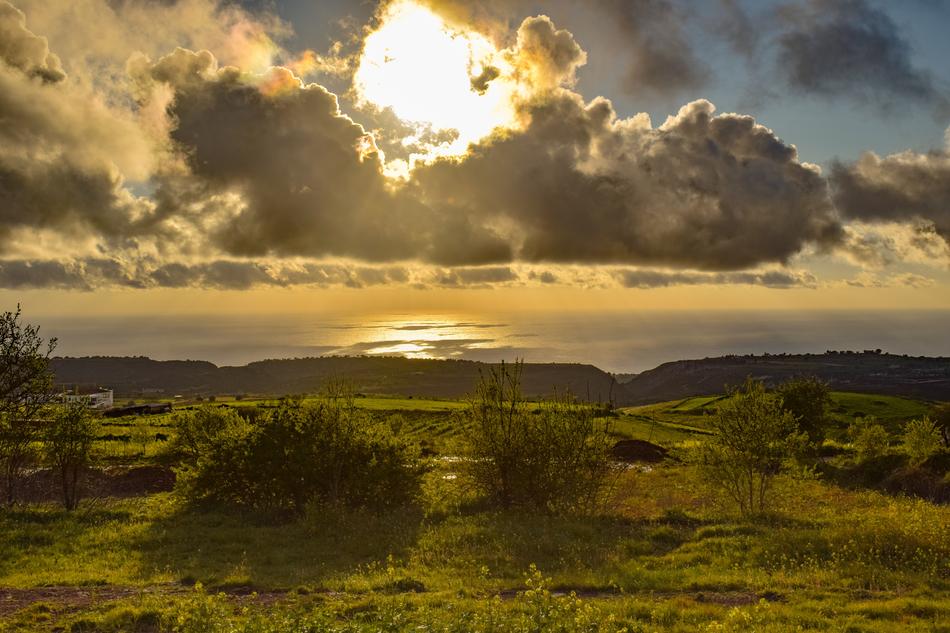 green field with clouds background, akamas, cyprus