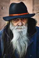 Portrait of the man, with the white beard, in the hat