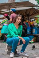 photoshoot of a young girl on a city street