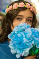 young model with blue flowers