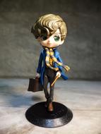 figurine of a young wizard