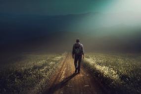 man walking on the road