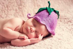 newborn in cute hat