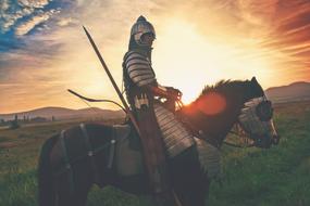 photo war on a horse in the highlands