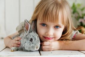 cute girl with grey rabbit