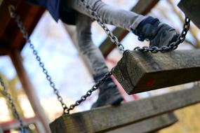 child Climbing Balance on Playground