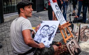 Man drawing art on the street