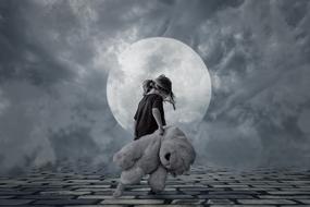 frustrating little girl with teddy bear on grey background