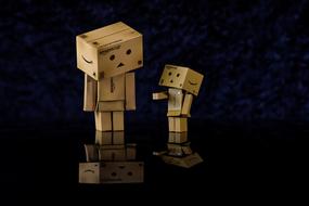 image of father Danbo and baby Danbo on a black background