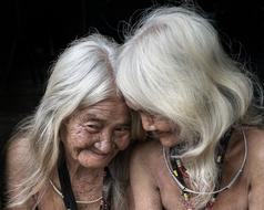 photo of two elderly asian girlfriends